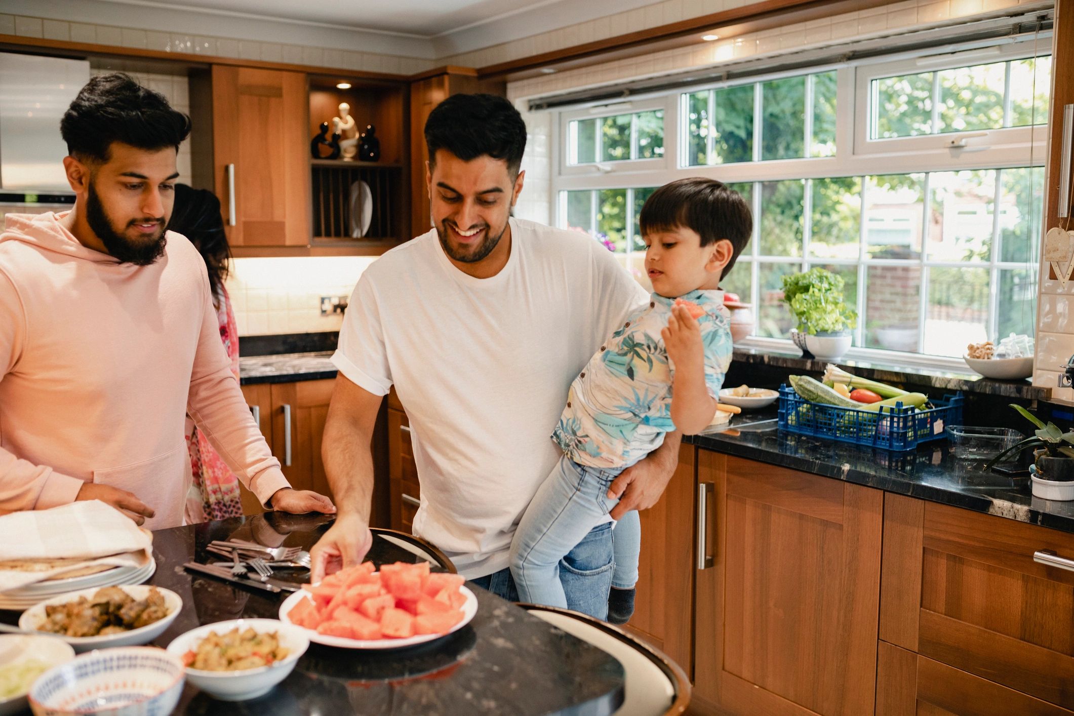 Family setting a table together