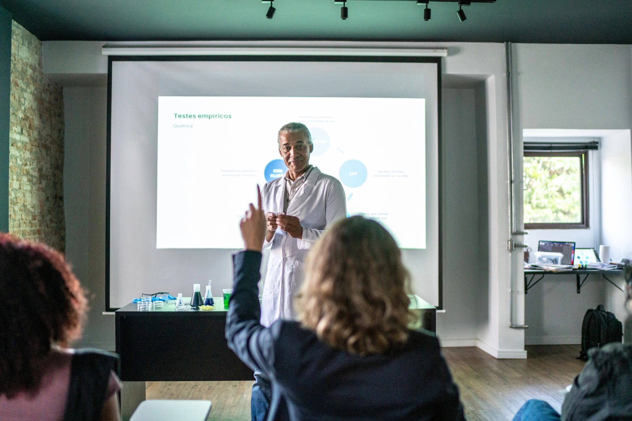Facilitator leading a community education session