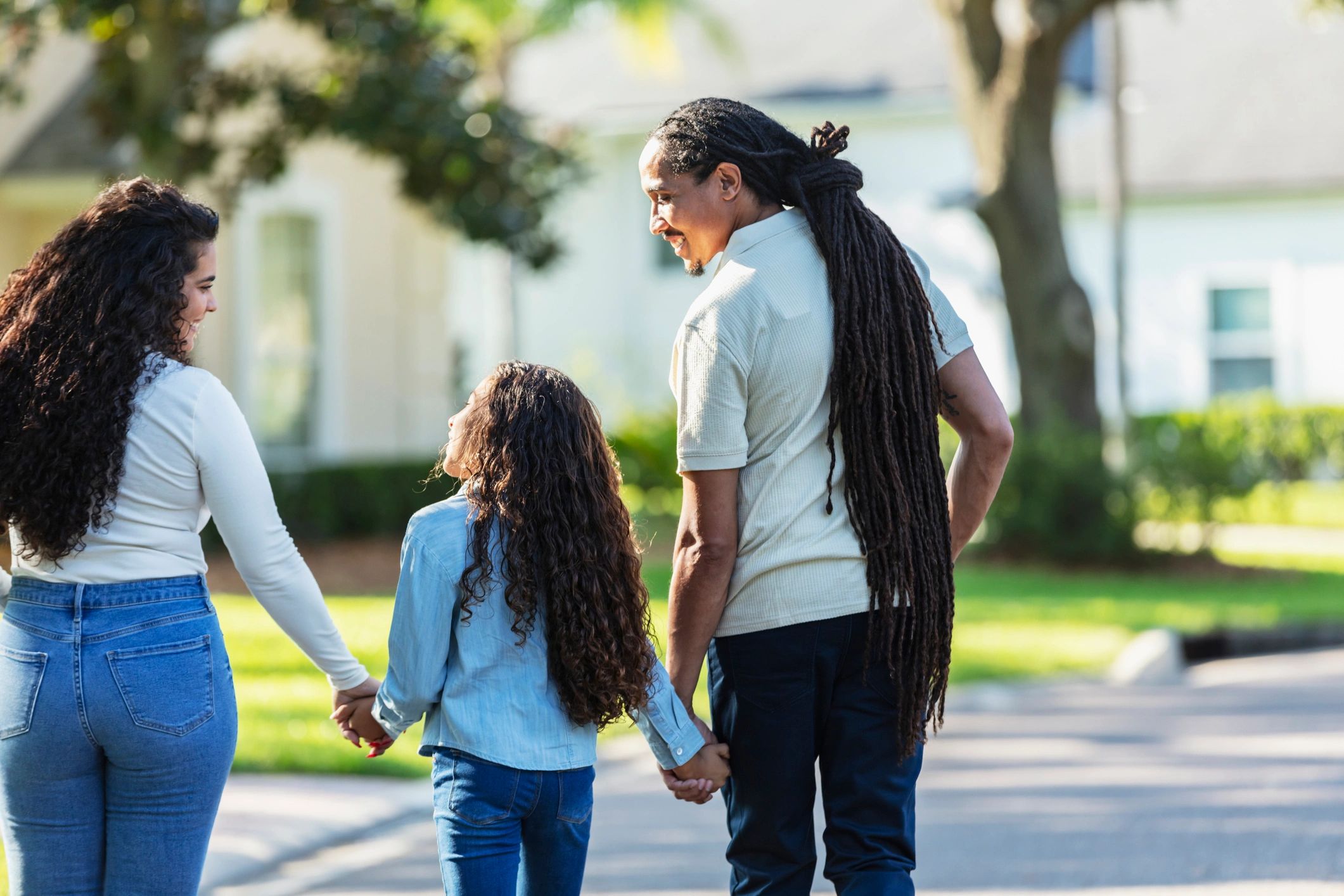 Family walking together in their neighborhood